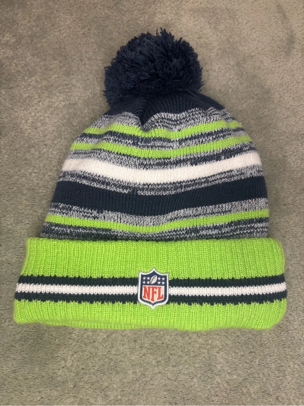 Seattle Seahawks beanie with Pom on top.